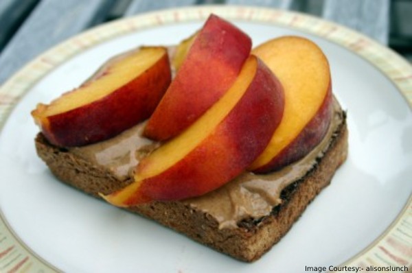 whole-grain bread with almond butter and peaches
