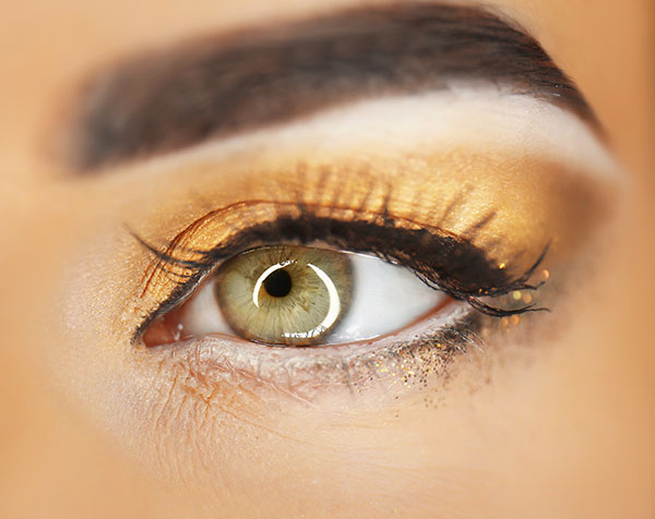 use of gold shimmer eye shadow